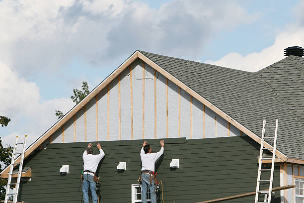 Professional Siding Installation technician working in Roosevelt, NJ
